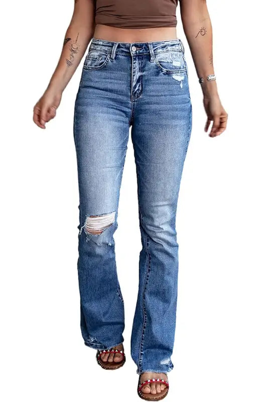 Blue distressed flare jeans