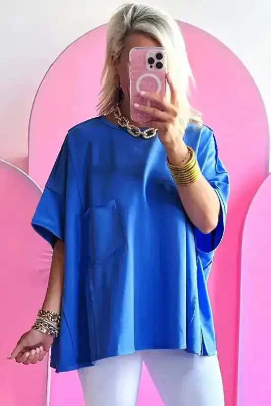 Side view of Blue Oversized Patched Pocket Exposed Seam T-Shirt showing exposed seam detail and oversized silhouette — Fashionfitz
