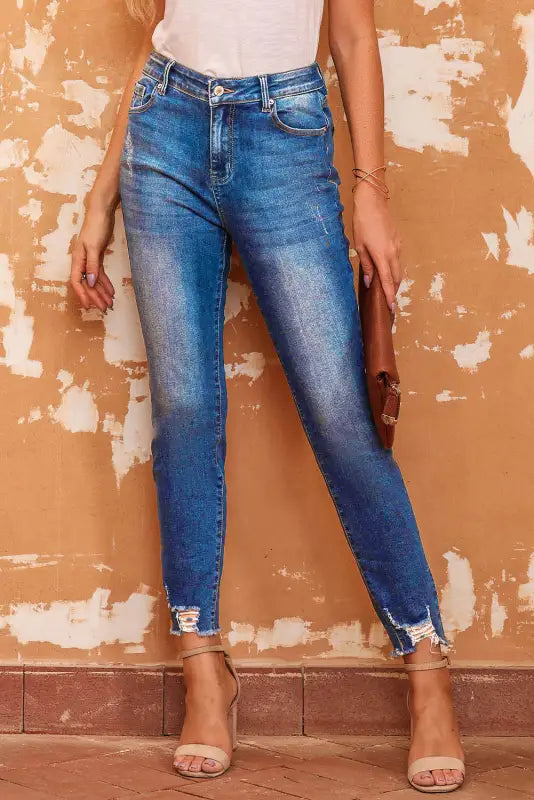 Blue raw hem ankle-length skinny jeans