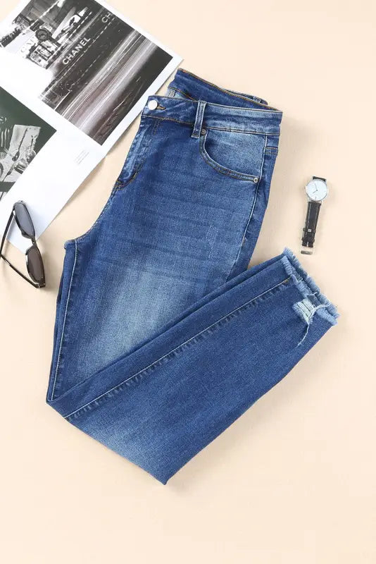 Blue raw hem ankle-length skinny jeans