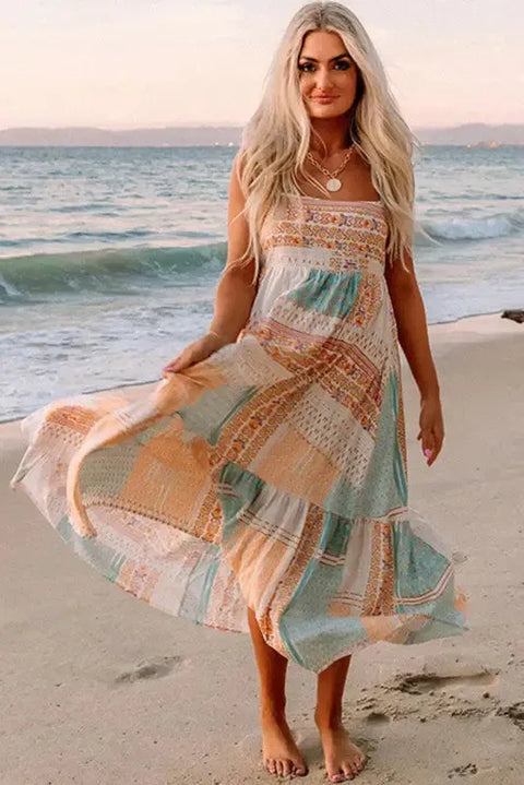 Woman wearing multicolour boho patchwork square neck maxi sundress front view Fashionfitz UK
