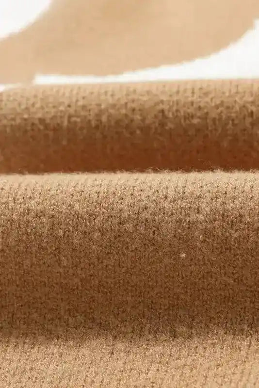 Fabric texture close-up of Bonbon Plus floral sweater showing soft, high-quality knit in beige for ultimate comfort and warmth.