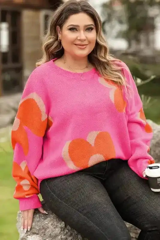 Bonbon Plus floral sweater paired with dark jeans, offering a cozy and trendy look for everyday plus-size fashion.