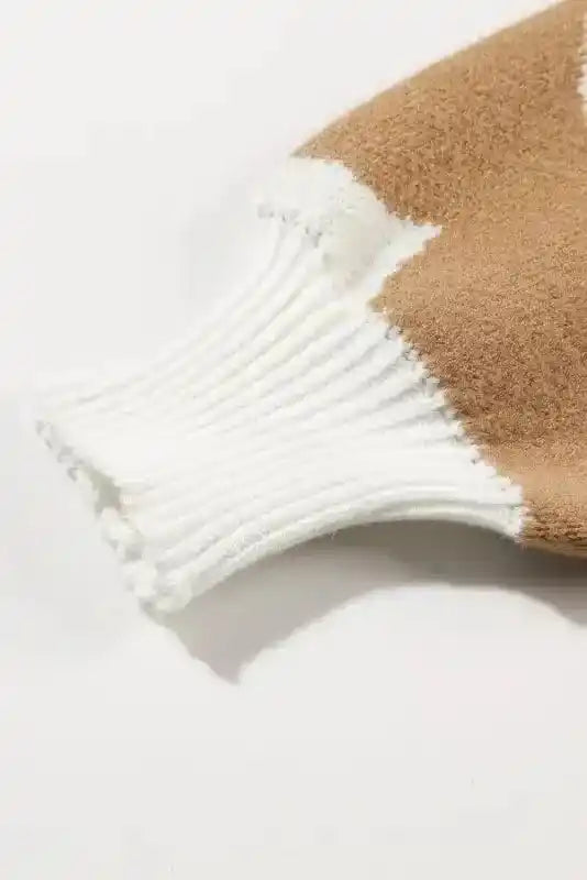 Close-up of ribbed white sleeve cuff on Bonbon Plus floral sweater, emphasizing stretch and cozy fit for cooler seasons.