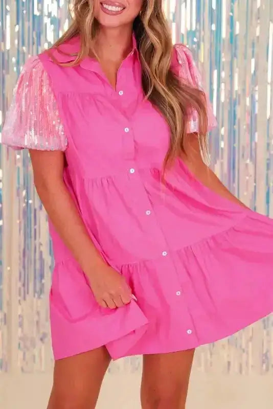 Bonbon Pink Sequined Shirt Dress with bubble sleeves and tiered ruffles, styled for a fun party look in a vibrant pink hue.