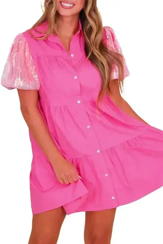 Front view of Bonbon Pink Sequined Shirt Dress showing button-down design, sequin puff sleeves, and playful ruffle tiers.