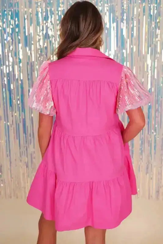 Back view of Bonbon Pink Sequined Shirt Dress featuring shimmering bubble sleeves and a tiered A-line silhouette.