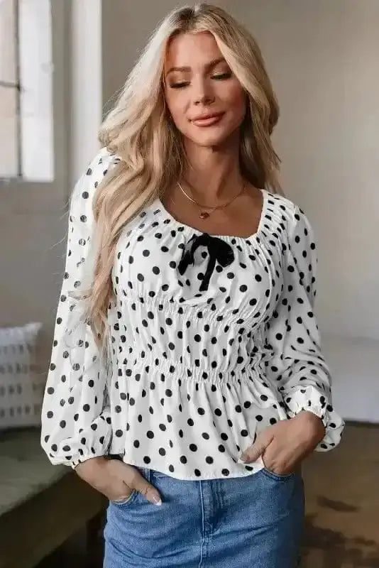 Polka Dot Bow Detail Puff Sleeve Peplum Blouse Women UK in black and white — front view showing polka dot print, bow detail and peplum — Fashionfitz