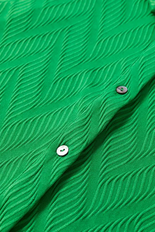 Bright green textured fabric with buttons from bright green co-ord shorts set - relax relax