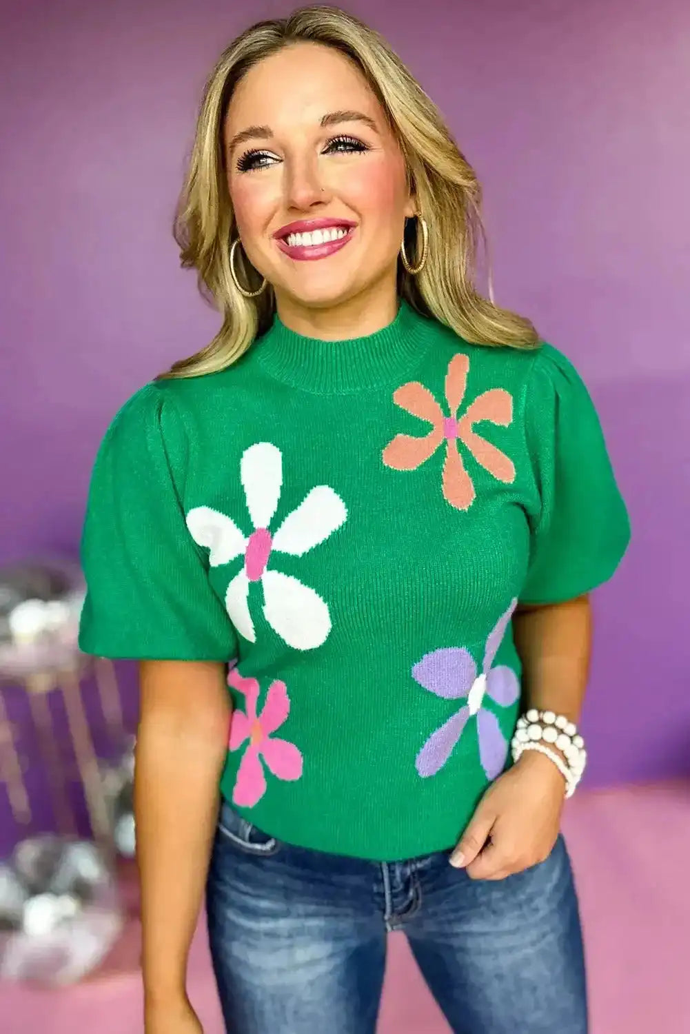 Bright green ladies sweater with colorful floral print and bubble short sleeves, perfect for spring fashion and casual wear.