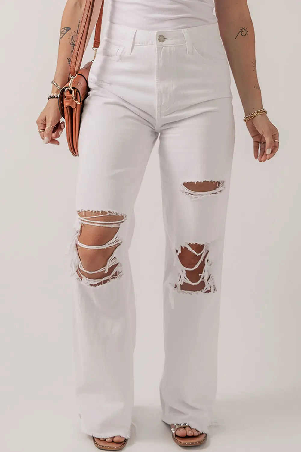 Bright white heavy distressed straight leg jeans - 10 98% cotton + 2% elastane