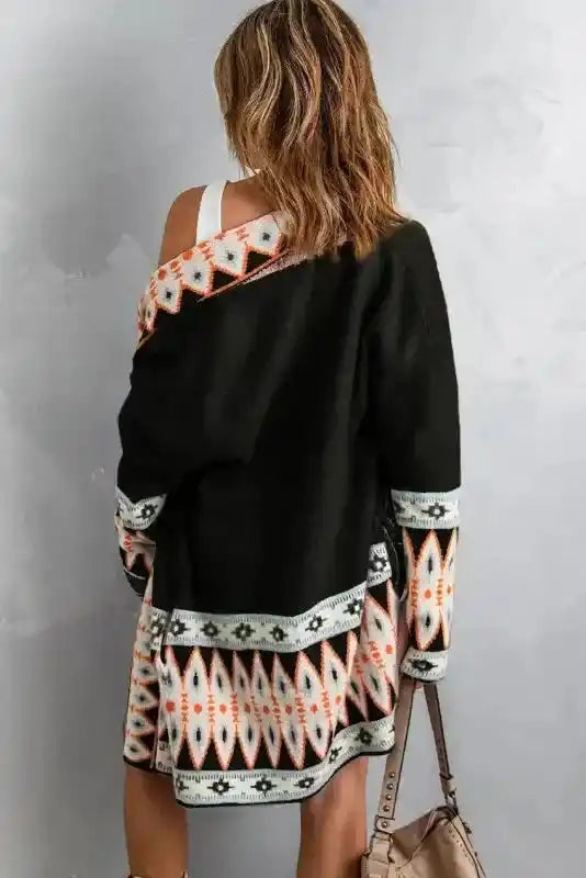 Back view of black Brown Aztec Print Cardigan, showcasing bold tribal patterns and relaxed fit for a cozy boho look.