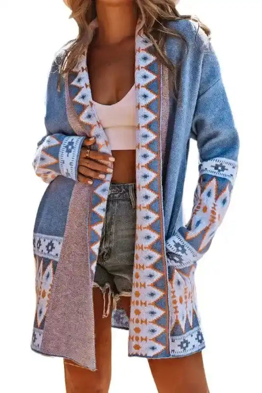 Front view of Brown Aztec Print Cardigan in blue, styled open over casual outfit, featuring bohemian tribal patterns and duster cut.