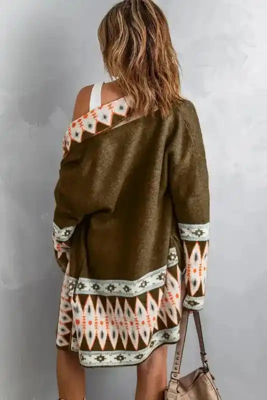 Back view of Brown Aztec Print Cardigan - Bohemian Style showing tribal detailing and relaxed duster fit for cozy winter fashion.