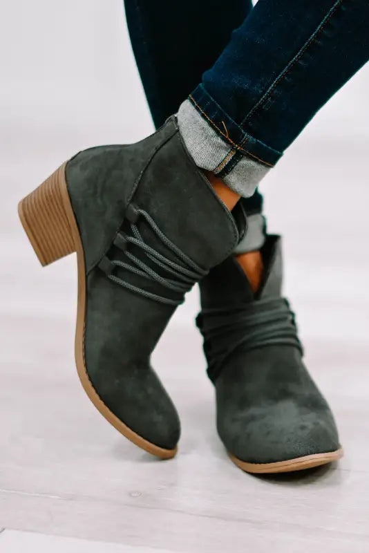 Brown criss cross slip-on point toe heeled boots