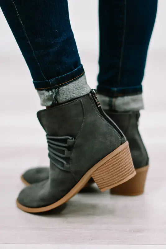 Brown criss cross slip-on point toe heeled boots