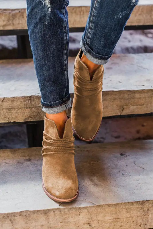 Brown criss cross slip-on point toe heeled boots