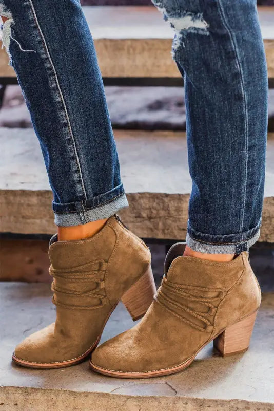 Brown criss cross slip-on point toe heeled boots