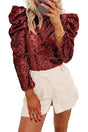 Burgundy Sequin Mock Neck Top with stylish bubble sleeves, paired with white shorts, perfect for night out or festive occasions.