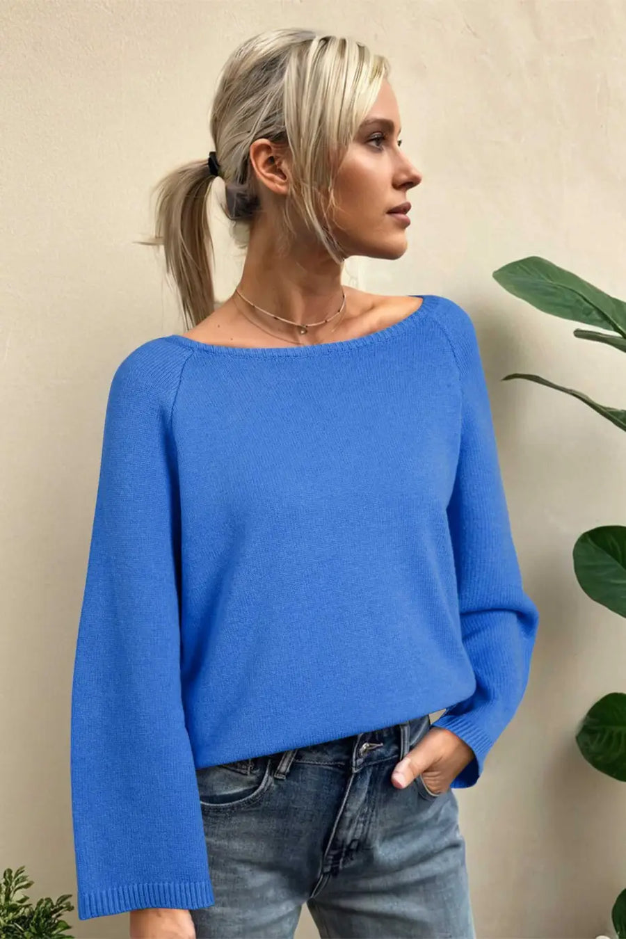 Relaxed fit blue Bell Sleeve Loose Knit Jumper with statement sleeves, perfect for layering in cooler seasons.