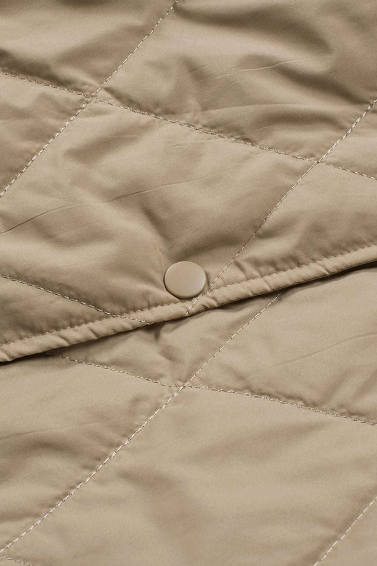 Close-up of snap button on Khaki Quilted Puffer Jacket – Hooded Snap Button Coat, emphasizing secure closure and quilted craftsmanship.