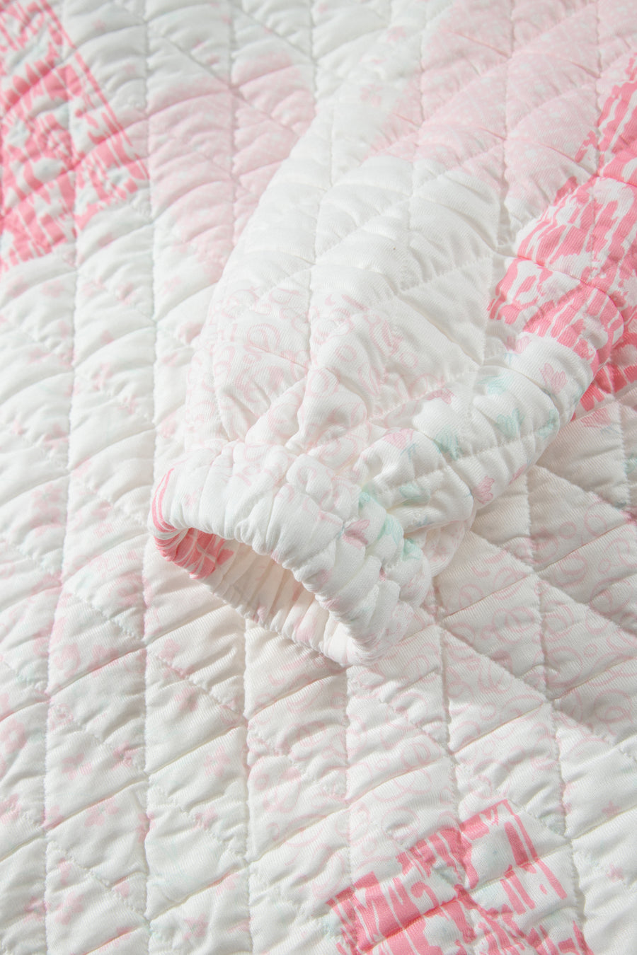 Pink Floral Quilted Half Button Pocketed Pullover Sweatshirt