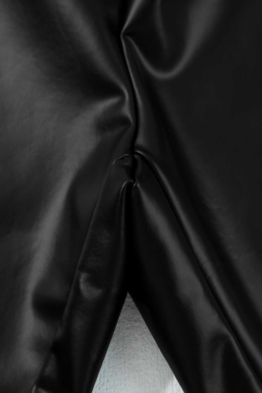 Close-up of inner seam construction on Black Vegan Leather Leggings – High‑Rise Skinny Fit, emphasizing quality stitching and comfort.