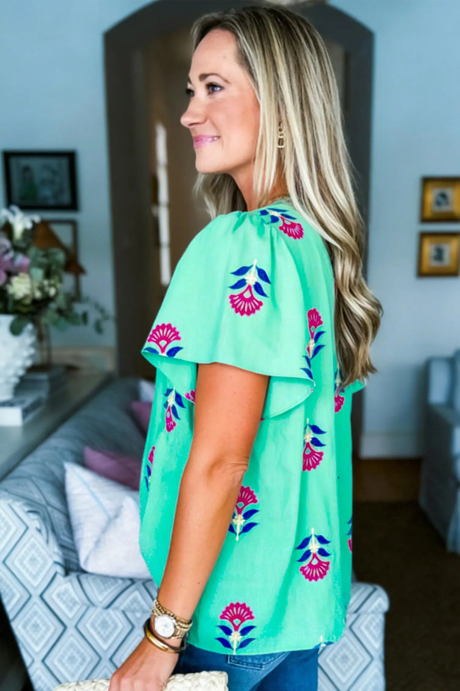 Women's floral blouse UK — flutter sleeve close-up, V-neckline detail
