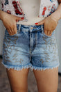 Women's western embroidery stud denim shorts front view casual