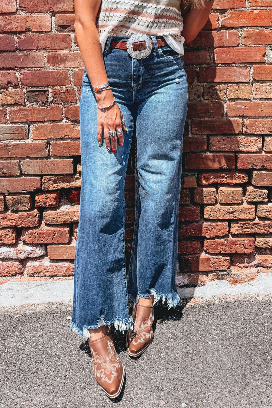 Flare jeans styled with tucked blouse and block heeled boots — Fashionfitz UK