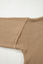Close-up of a Khaki Oversized Jumper Dress on a light background