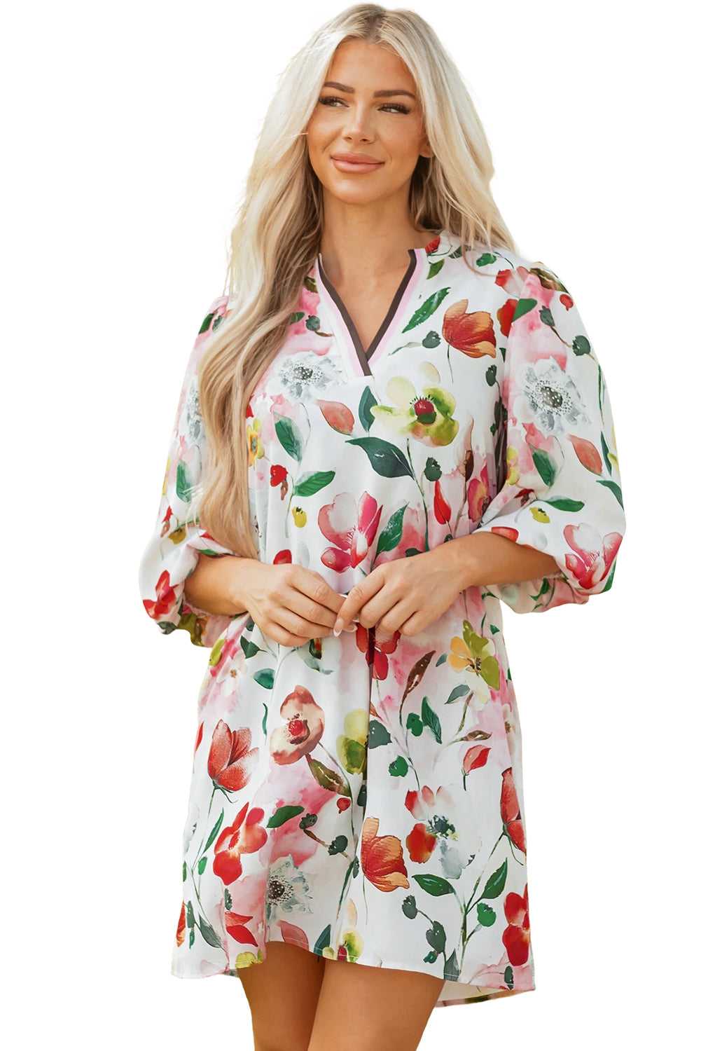 Isolated view of model in Floral Shift Dress - Casual Elegance on white background, highlighting silhouette and floral design.