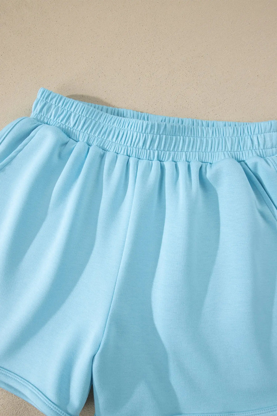 Exposed seam mock neck oversized tee shorts two piece set pockets outfit sets