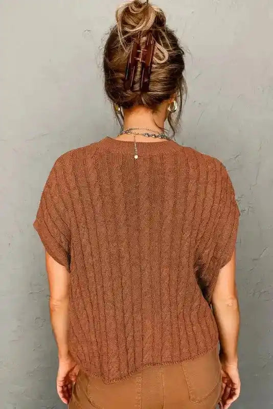 Back view of rust brown Cable Knit Short Sleeve Sweater showing soft knit texture and relaxed fit, ideal for fall fashion.