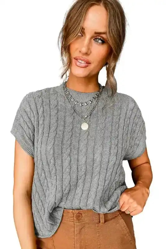 Gray Cable Knit Short Sleeve Sweater on white background, showcasing its lightweight knit and classic cable design.