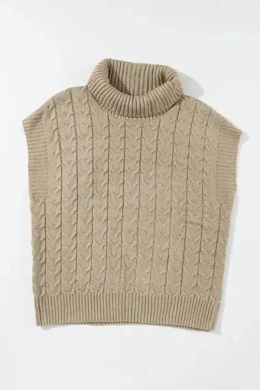 Flat lay of beige cable knit turtleneck short sleeve jumper. Lightweight and stretchable women’s sweater top in soft acrylic.
