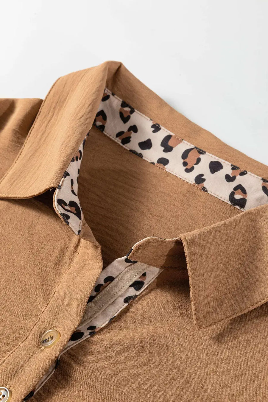 Close-up of collar and button placket on Camel Leopard Fusion Blouse showing leopard print contrast lining — Fashionfitz