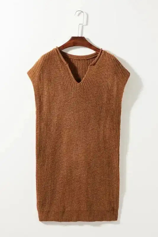 Flat lay of Camel Knit Dress - Short Sleeve V-Neck Shift Fit on hanger. Minimalist solid color design perfect for fall fashion.