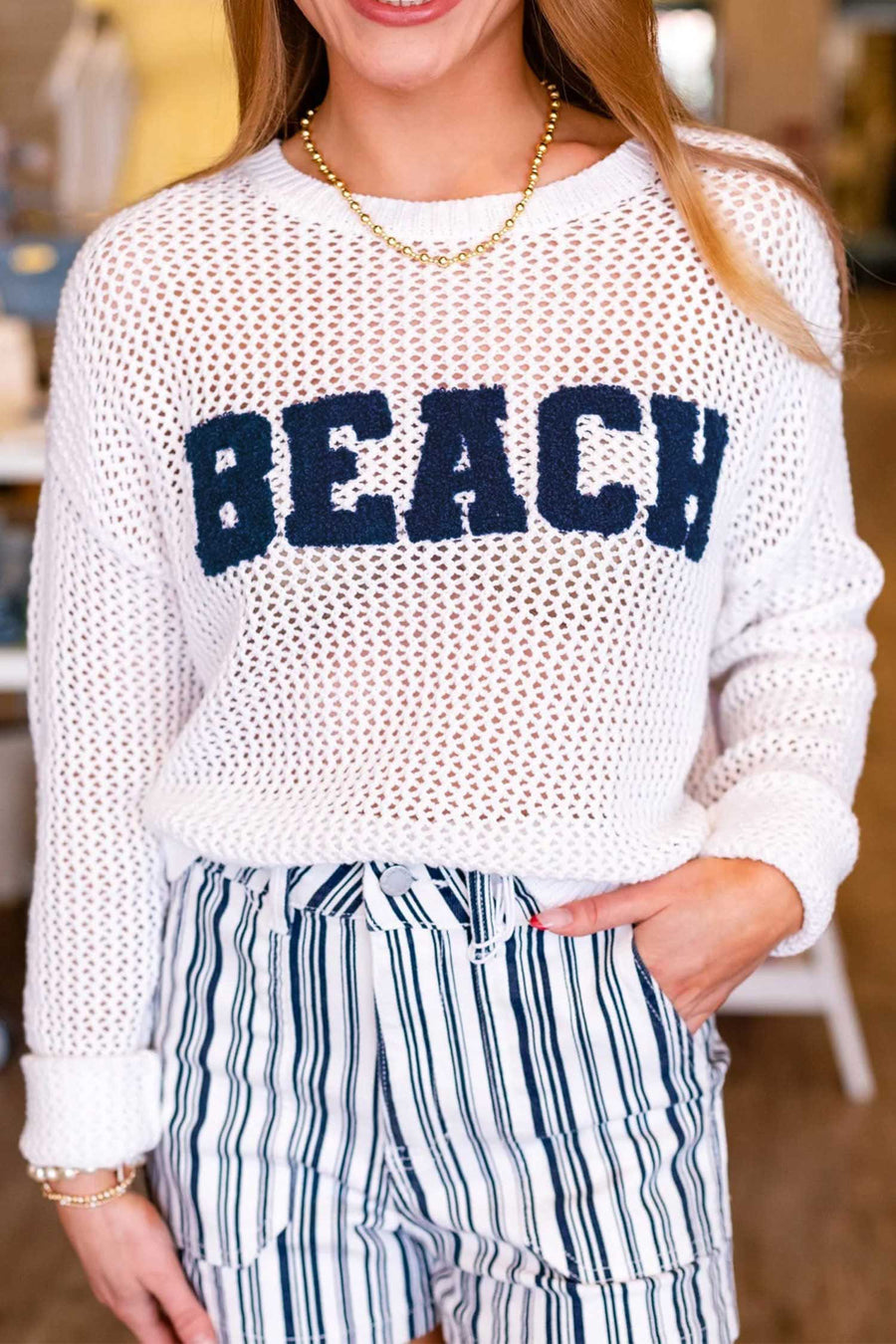 Chenille beach knit sweater styled over swimwear at the beach — Fashionfitz UK