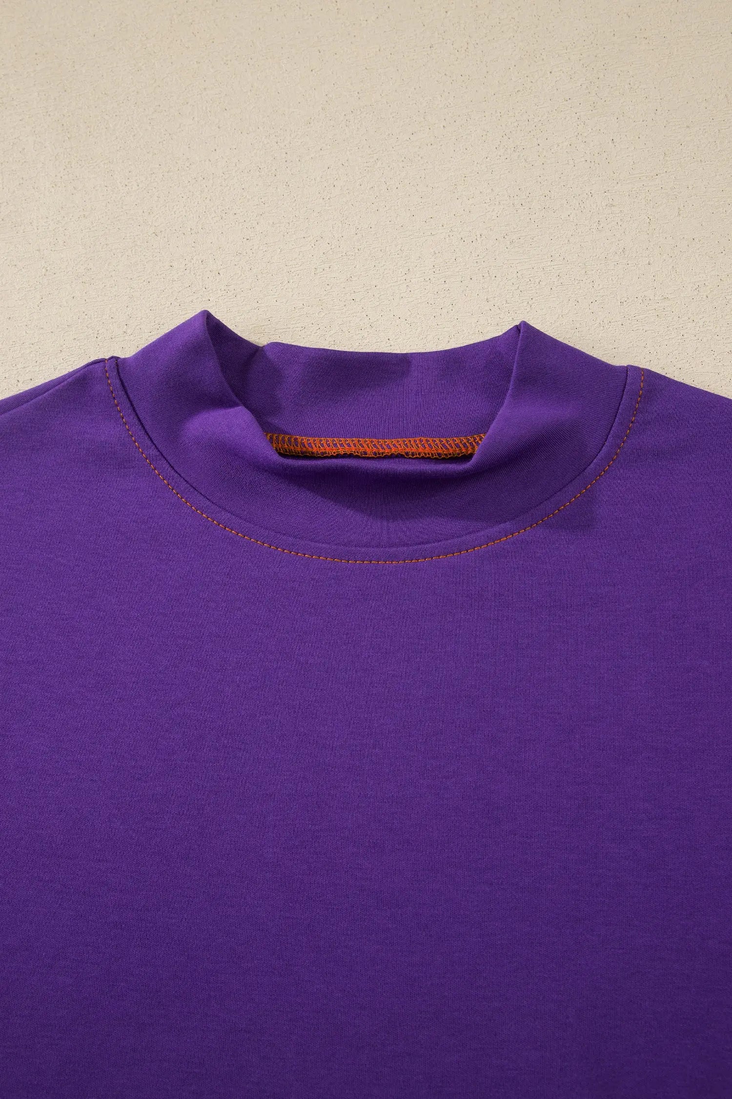 Women's contrast stitch high neck tee side view casual summer