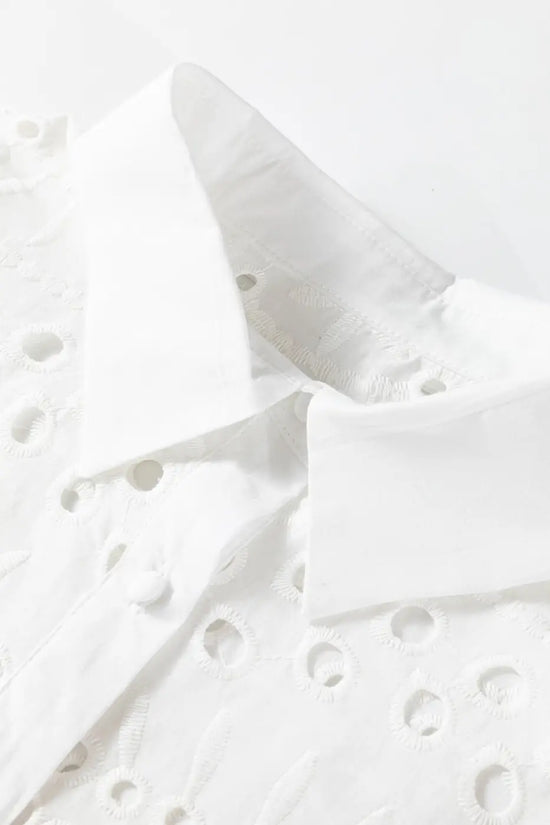 Close-up of collar and embroidery on White Cutwork Embroidered Crop Top, highlighting quality cotton fabric and neat stitching.