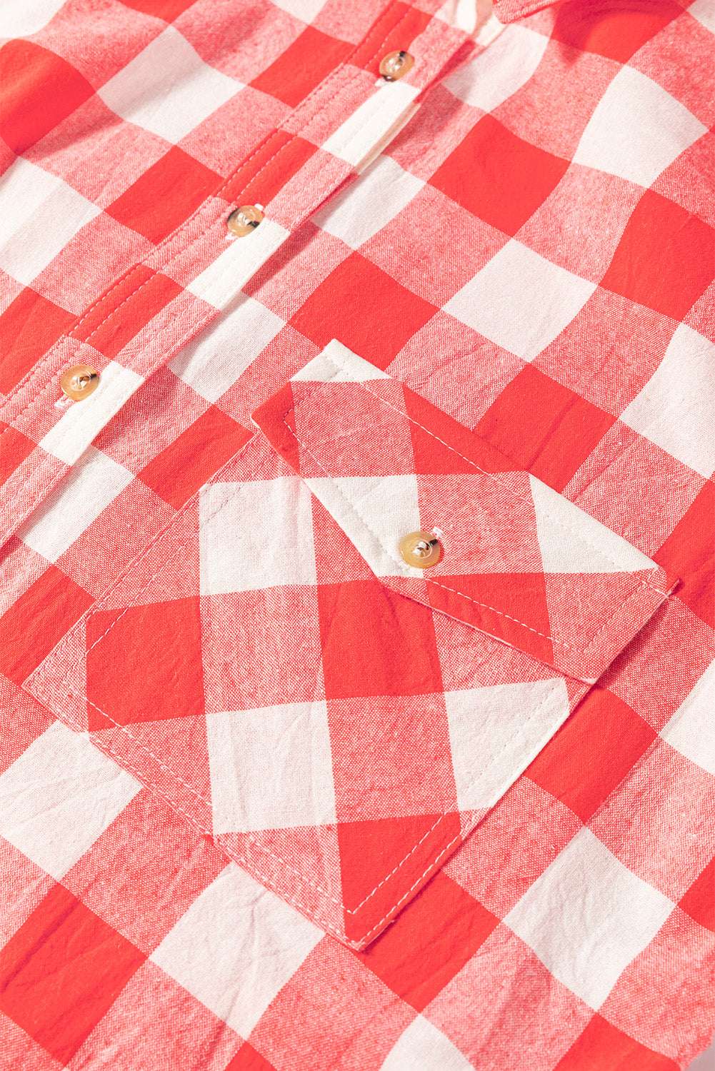 Red and white checkered shirt with front pocket and button details