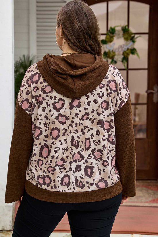 Back view of Curve Brown Leopard Knit Panel Hoodie for Women showing leopard print and brown knit sleeves, ideal for curvy figures.
