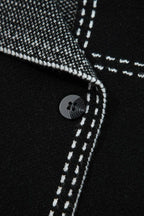 Close-up of button and inner lining on Women's Black Contrast Trim Knitted Cardigan, emphasizing quality stitching and craftsmanship.
