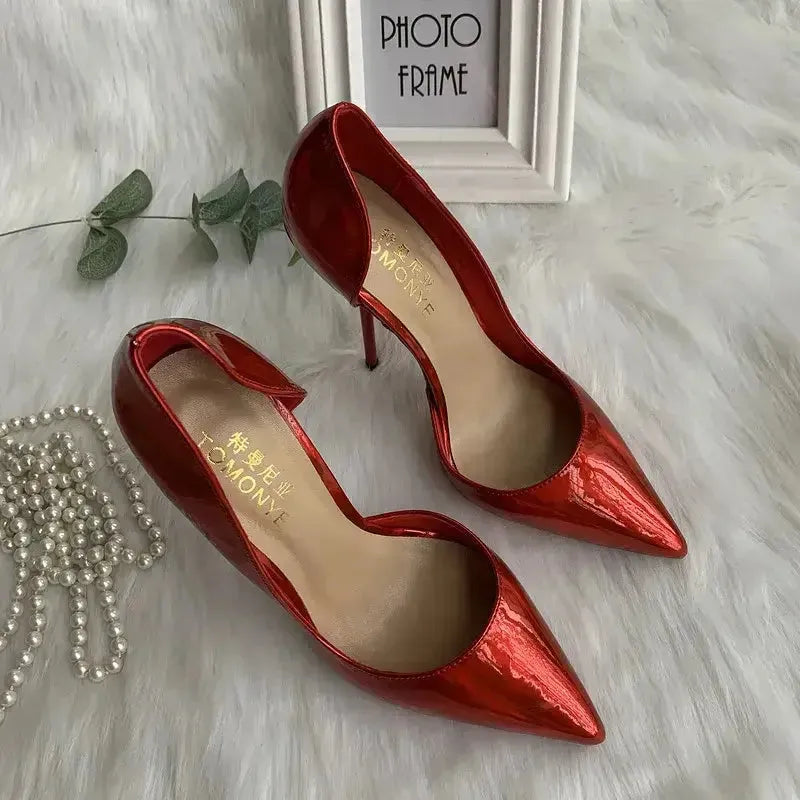 Cherry red stiletto pumps angled view showing soaring heel height Fashionfitz UK
