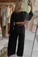 Chic black belted jumpsuit by fashionfitz