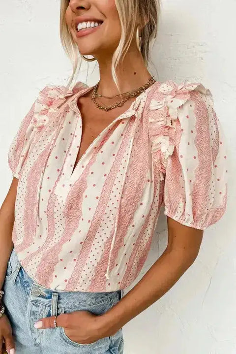 Close-up of Chic Peek Puff Sleeve Blouse highlighting the soft cotton fabric, ruffle shoulders, and polka dot stripe pattern.