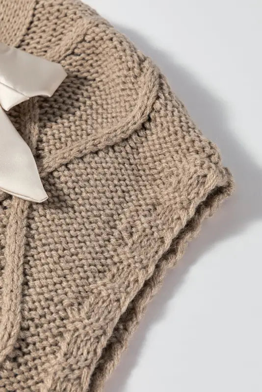 Chic taupe cable knit sweater | satin bow short sleeve elegance