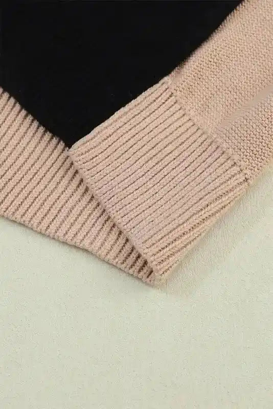 Hem detail of Coffee Leopard Print Colorblock Pullover Sweater - New, featuring beige and black ribbed knit for contrast.