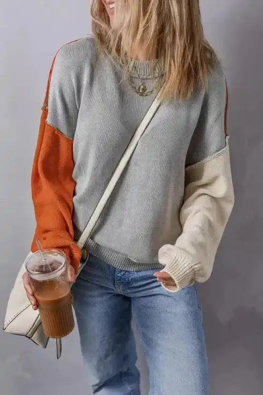 Relaxed fit of Coffee Leopard Print Colorblock Pullover Sweater - New, featuring colorblock sleeves and soft knit texture.